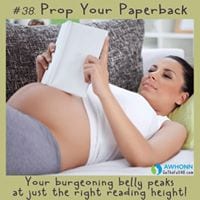 Prop up your paperback—your burgeoning belly peaks at just the right reading height