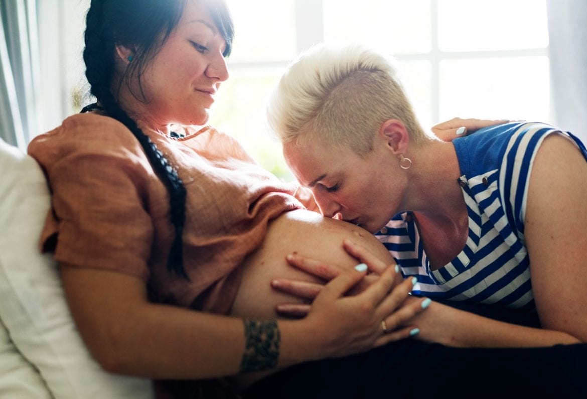 Lesbian moms both breastfeeding